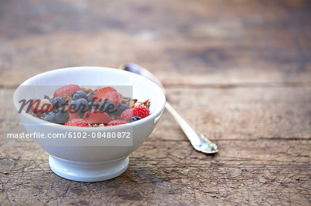 Fruits with muesli in bowl