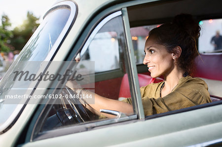 Smiling woman driving