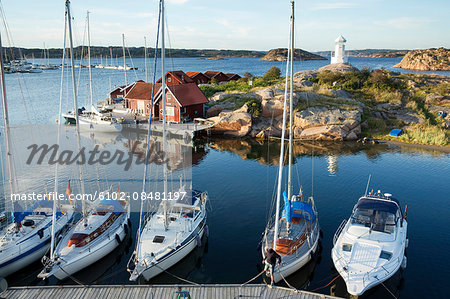 Sailing boats moored at coast