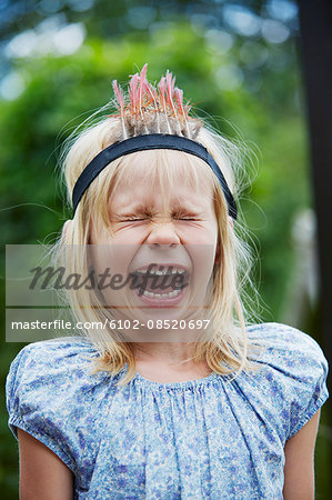 Girl shouting in garden