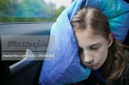 Girl sleeping in car