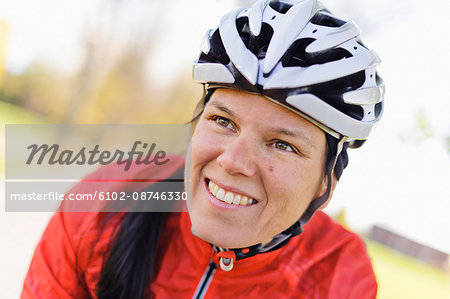 Portrait of woman wearing cycling helmet