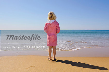 Girl standing on beach