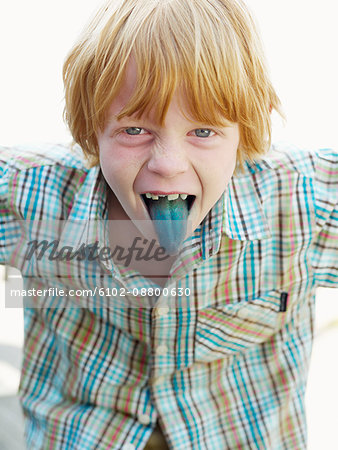 Boy sticking his blue tongue out, Sweden.