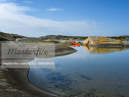 Kayak on rocky coast