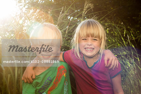 Portrait of smiling brother and sister