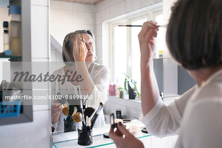 Woman doing make-up