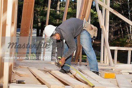 Carpenter measuring board length