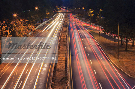 Storrow Drive with car lights at dawn in Boston, Massachusetts, USA