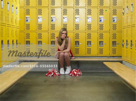 Teenage Girl 16 18 Cheerleader Sitting In Locker Room