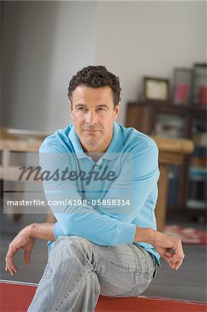 Man sitting indoors