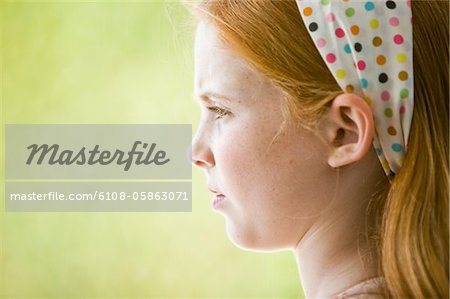 Close-up of a girl thinking