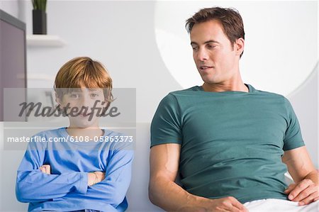 Man sitting with his son