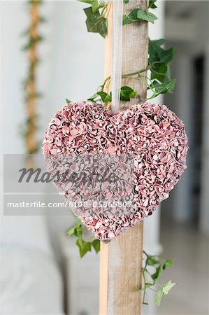 Close-up of heart shape decorated petals in a bedroom
