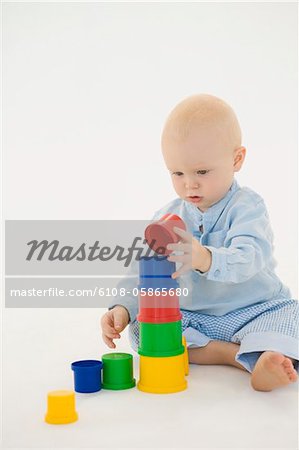 Baby boy stacking blocks