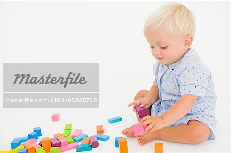 Baby boy playing with blocks