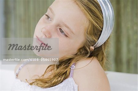 Close-up of a girl thinking