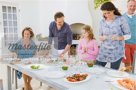 Family having breakfast at the dining table