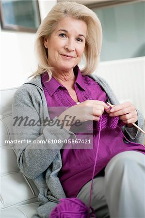 Portrait of a woman knitting