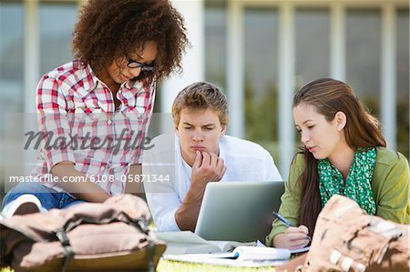 Friends studying in a campus