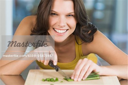 Woman chopping chives