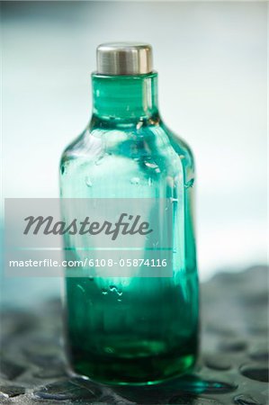 Close-up of an empty bottle of aromatherapy oil