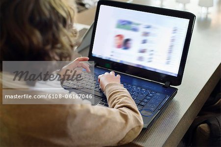 Boy using laptop