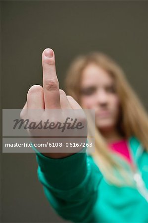 Girl showing middle finger