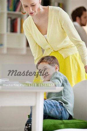 Woman with her son at a dining table