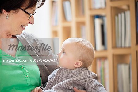 Woman playing with her granddaughter