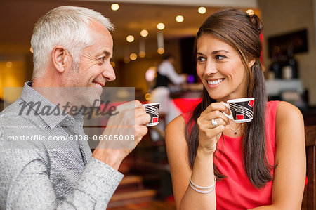 Couple enjoying cup of tea in a restaurant