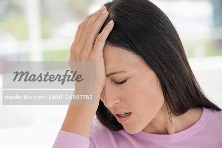 Woman suffering from a headache