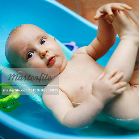 baby boy taking a bath