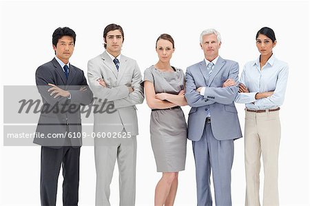 Close-up of a multicultural business team against white background Close-up of a multicultural business team against white background