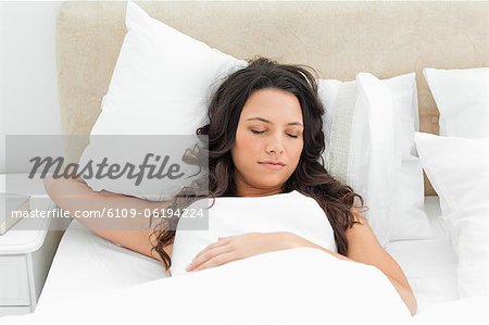 Charming young woman sleeping