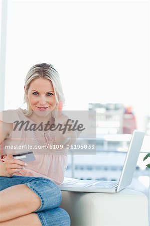 Close-up of a blonde approving the shopping online