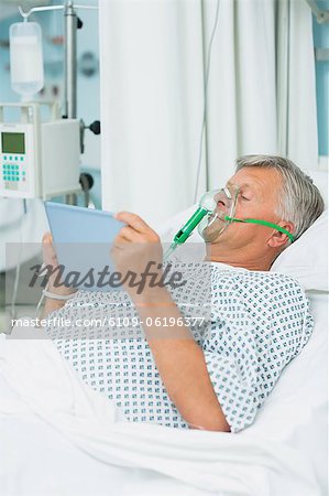 Male patient wearing an oxygen mask