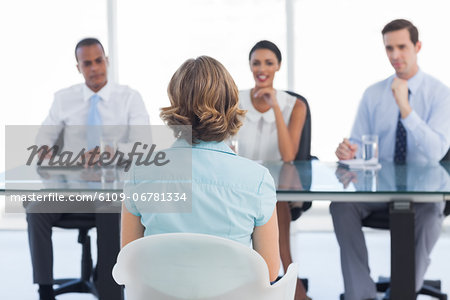 Female applicant sitting during a job interview