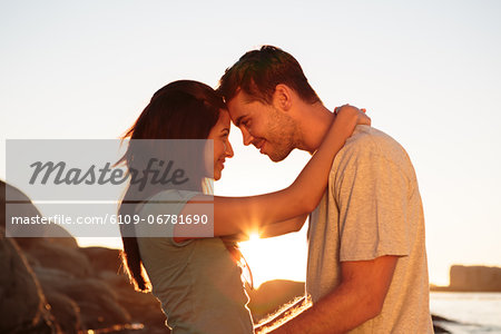 Couple embracing each other on the beach