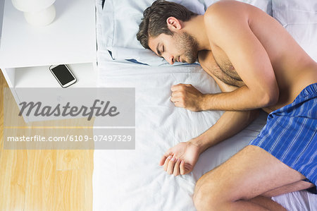 Laying in bed in boxers pictures Stock Photos - Page 1 : Masterfile