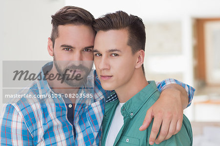 Homosexual couple men looking at the camera