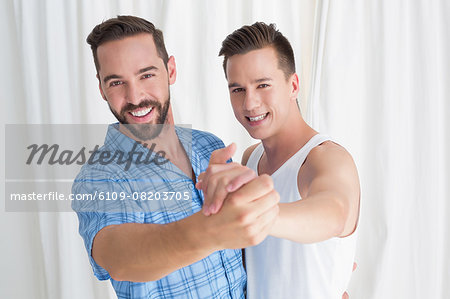 Happy homosexual couple having fun