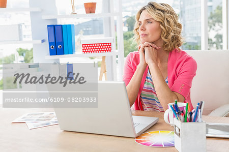 Thoughtful casual businesswoman