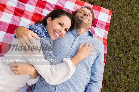 Smiling couple on date relaxing with eye closed Smiling couple on date relaxing with eye closed