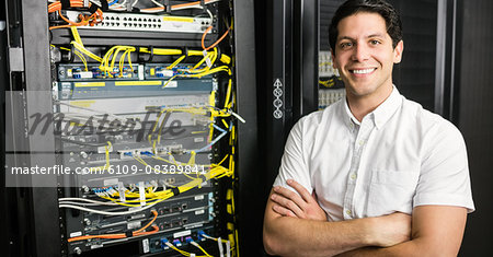Confident technician smiling at camera Confident technician smiling at camera
