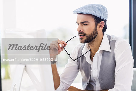 Focused man working on computer