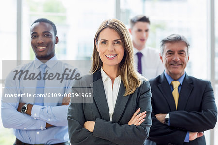 Business smiling people posing together