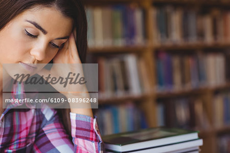 Concentrated female student studying