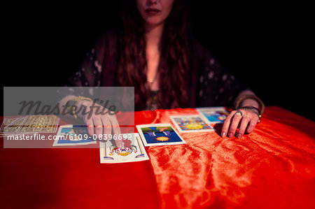 Fortune Teller Pointing At Tarot Card Stock Photo Masterfile Premium Royalty Free Code 6109