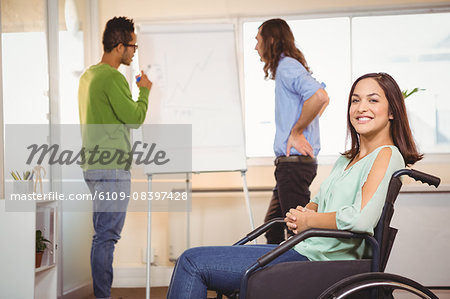 Portrait of creative businesswoman on wheelchair